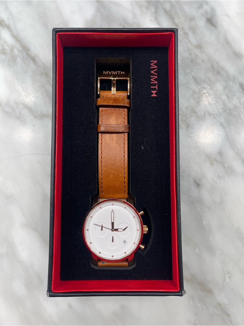 Men’s MVMT chronograph style watch with white dial and brown leather strap